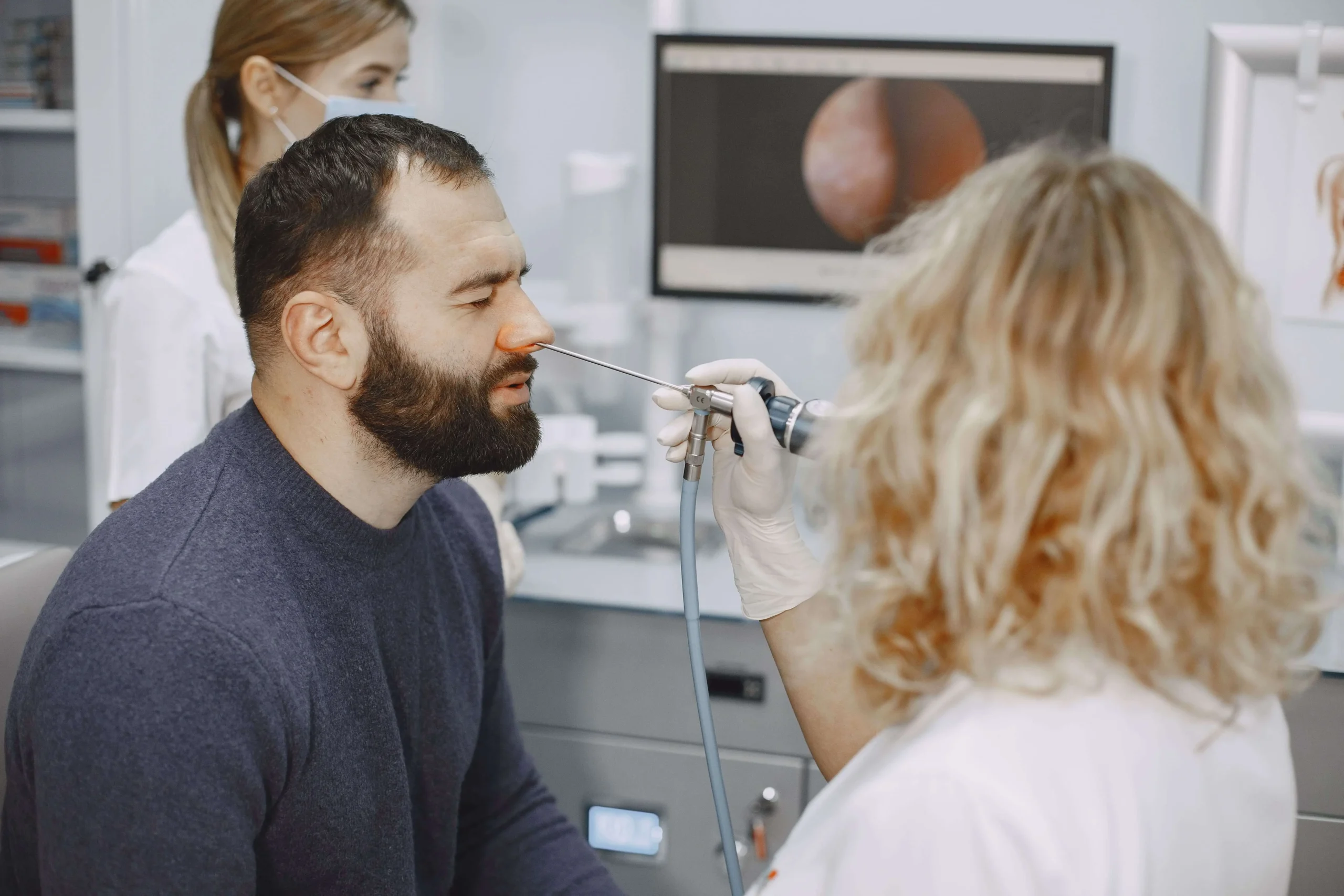 ENT specialist performing a nasal endoscopy at Gouda Ramesh ENT Hospital